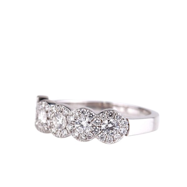 Bague cinq diamants entourage diamants