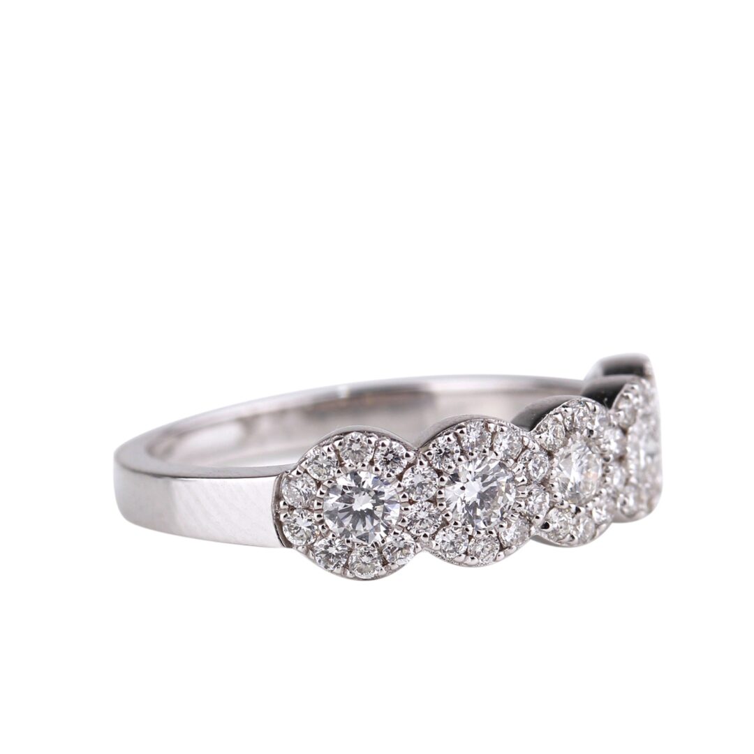 Bague cinq diamants entourage diamants