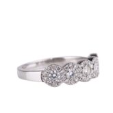Bague cinq diamants entourage diamants