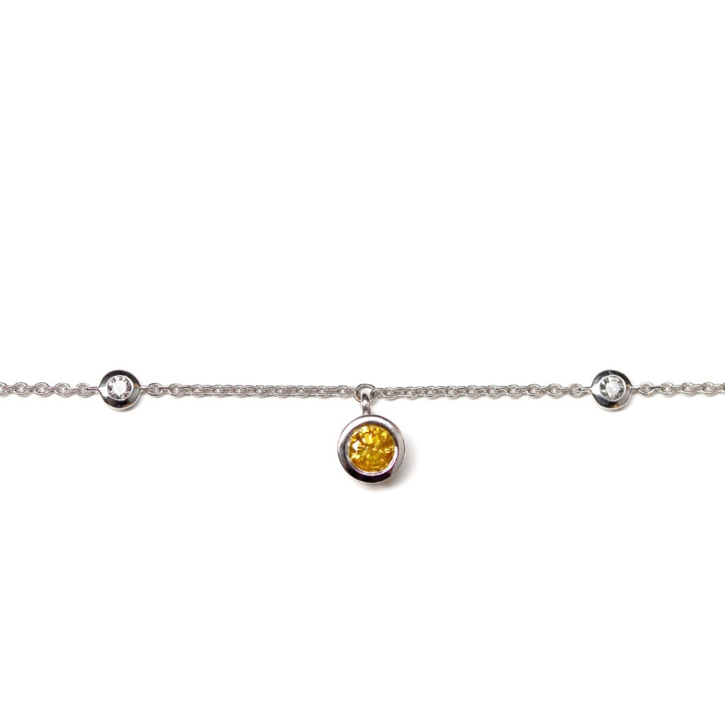 Bracelet souple diamants et diamant jaune