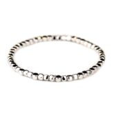 Bracelet composé de dés d'or blanc 18 K