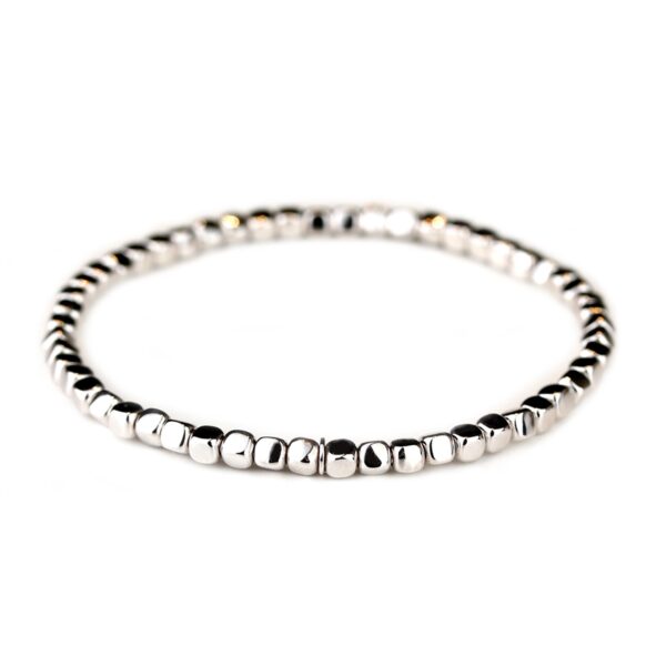 Bracelet composé de dés d'or blanc 18 K