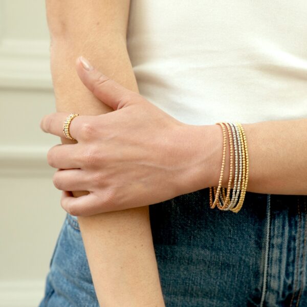Bracelet perles d'or blanc facettées