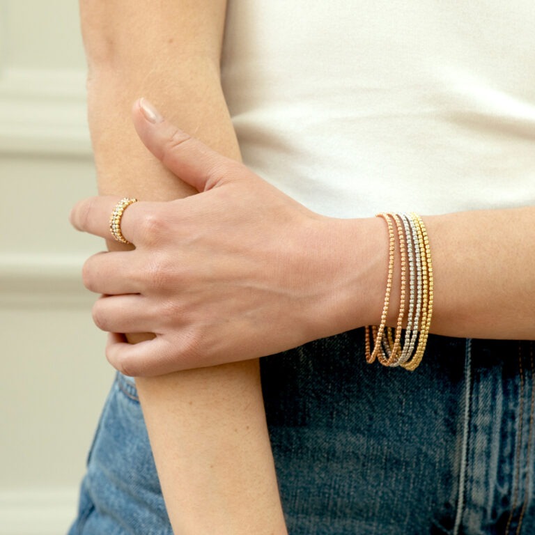 Bracelet perles d'or blanc facettées