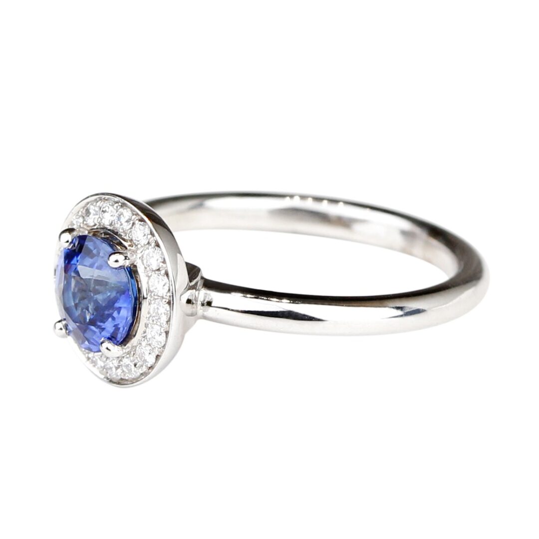 Bague saphir rond entourage diamants