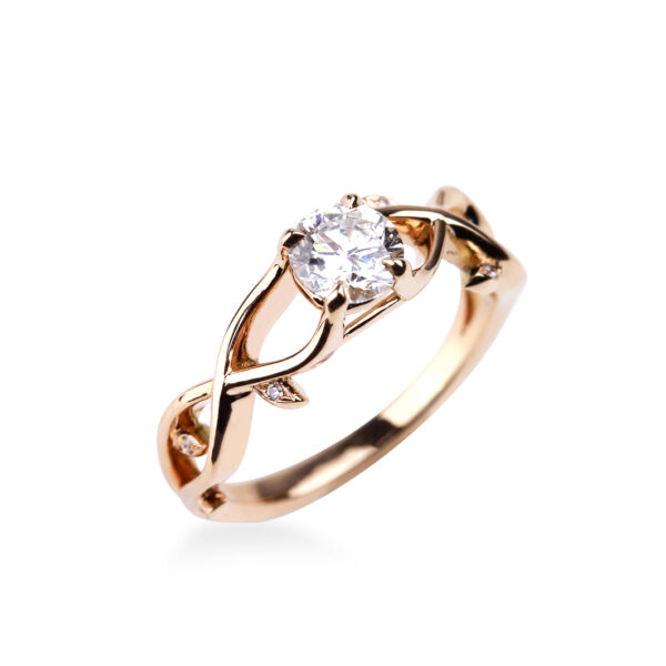 Solitaire diamant or rose aux lignes végétales