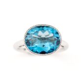 Bague topaze bleue or blanc Divine