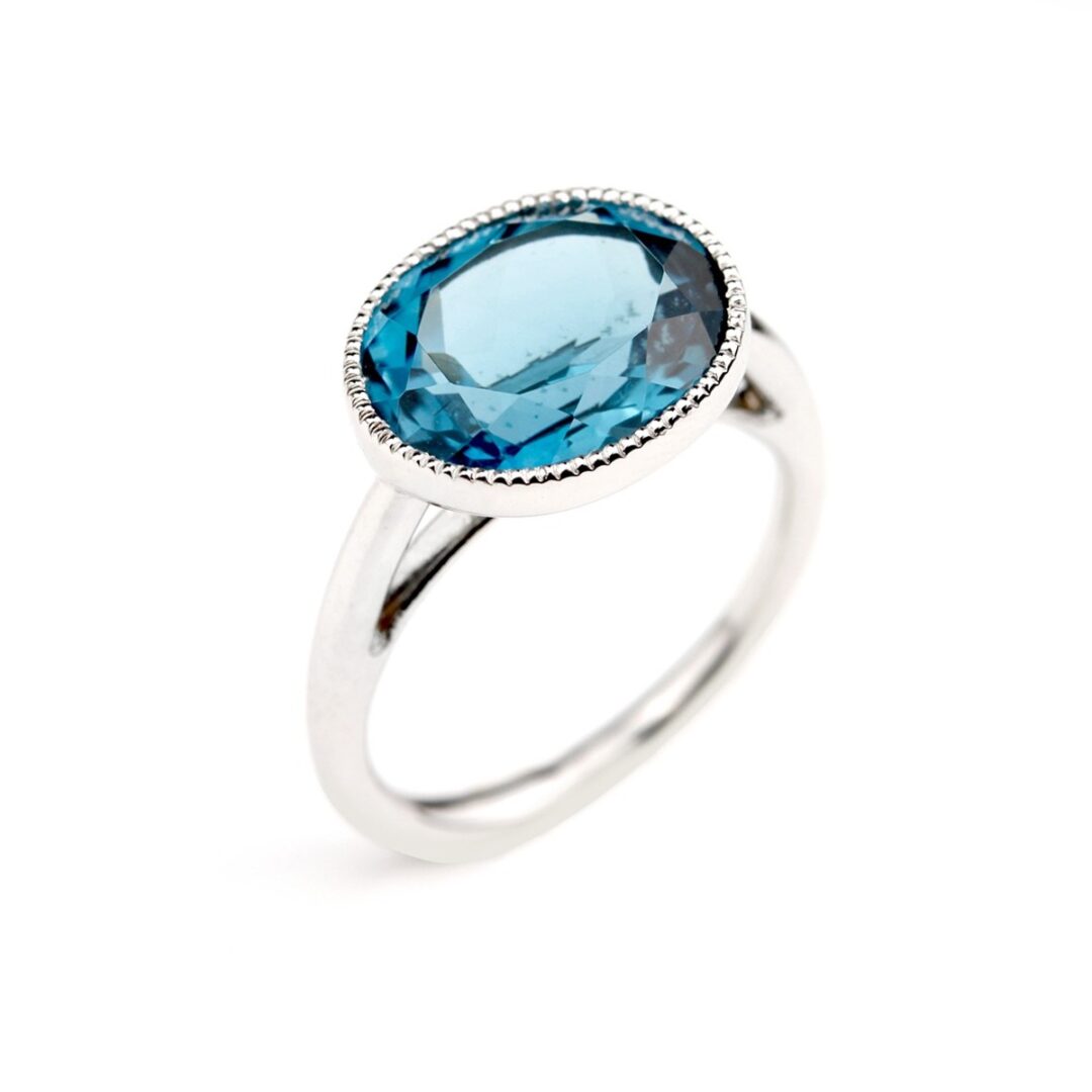 Bague topaze bleue or blanc Divine