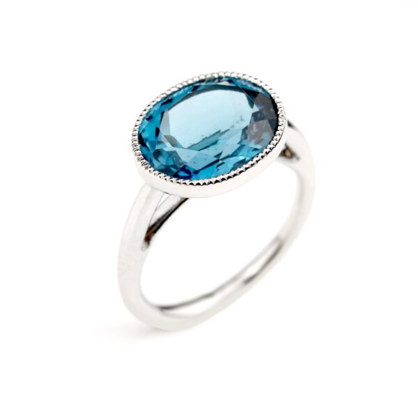 Bague topaze bleue or blanc Divine