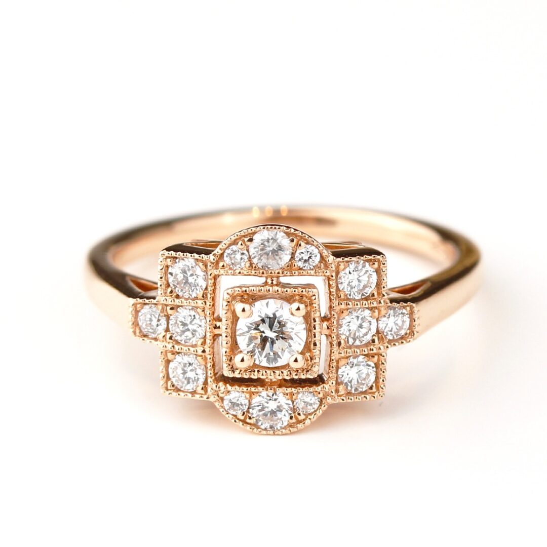 Bague style Art Déco diamants et or rose millegrain